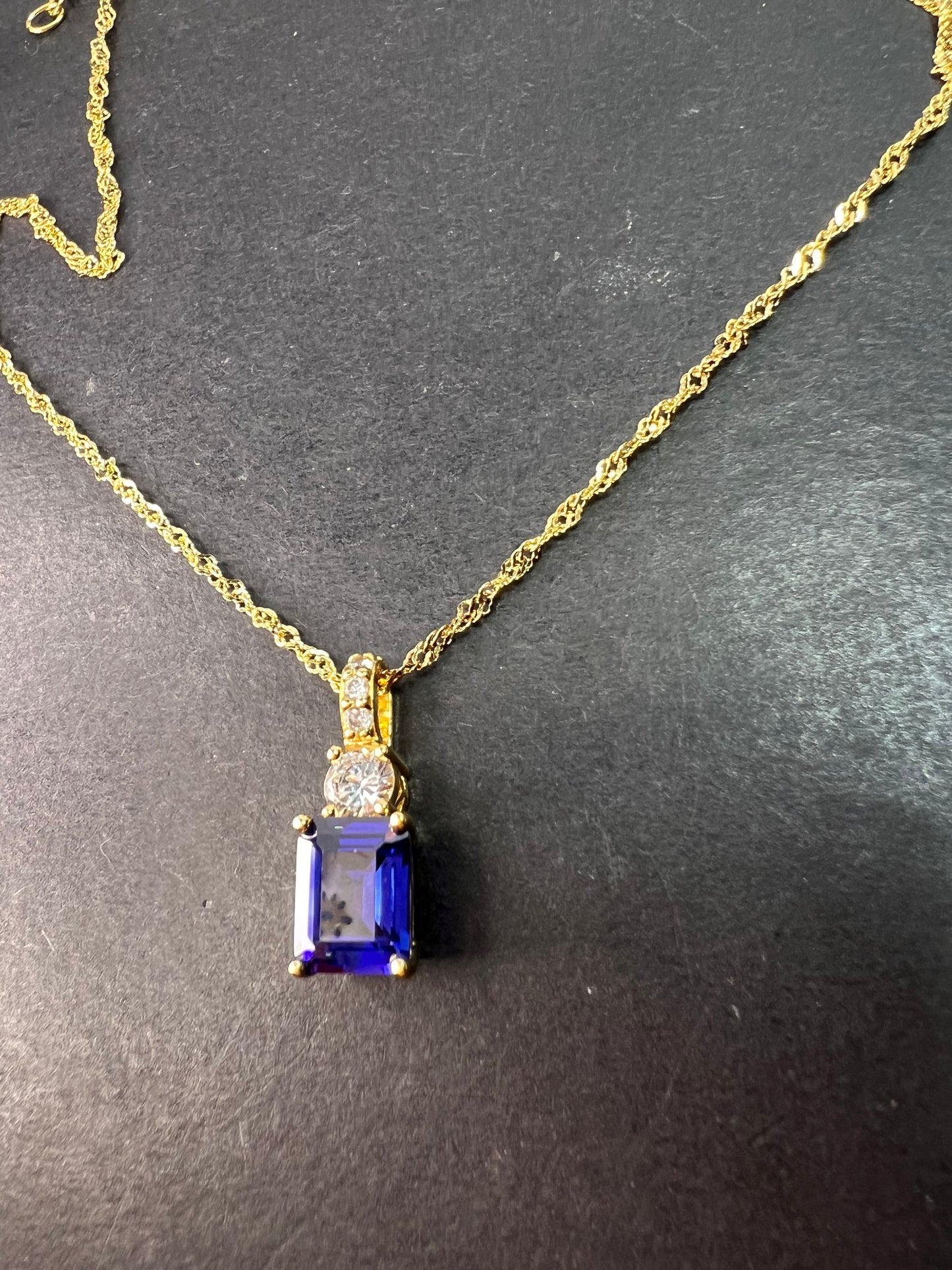 Blue emerald cut CZ pendant and chain necklace in gold over sterling silver 18 inches