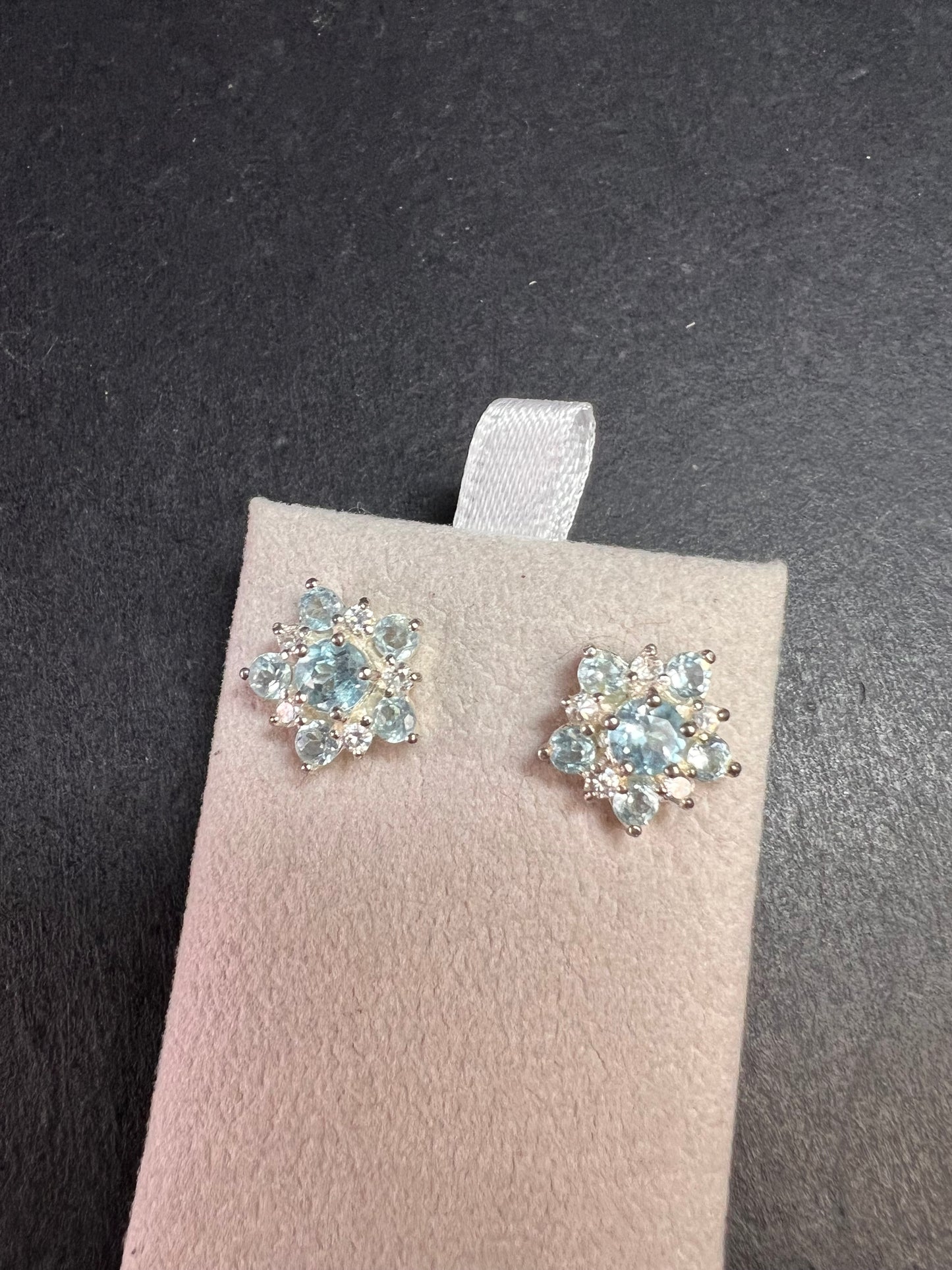 Vintage blue topaz and cz sterling silver snowflake stud earrings