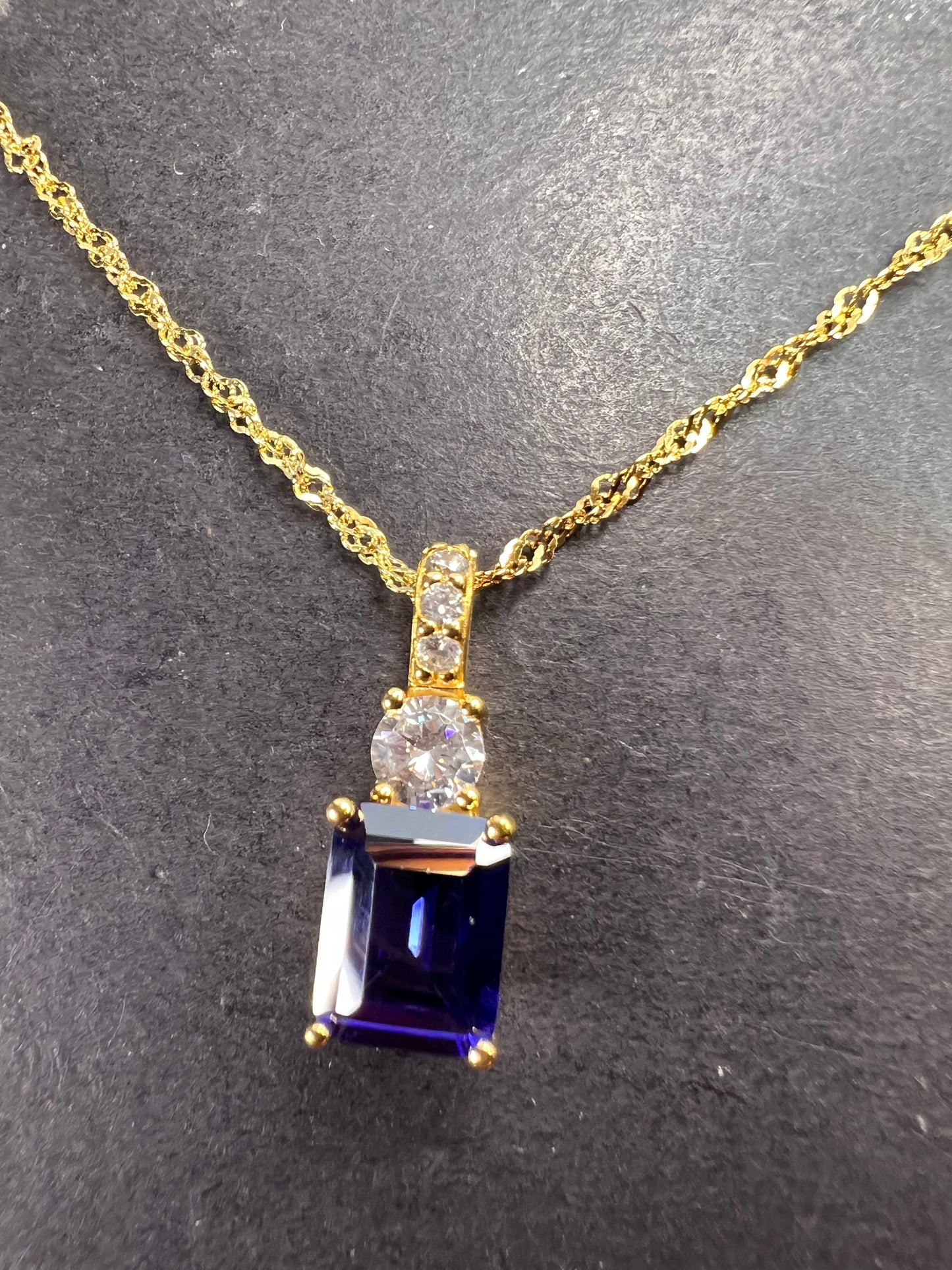 Blue emerald cut CZ pendant and chain necklace in gold over sterling silver 18 inches