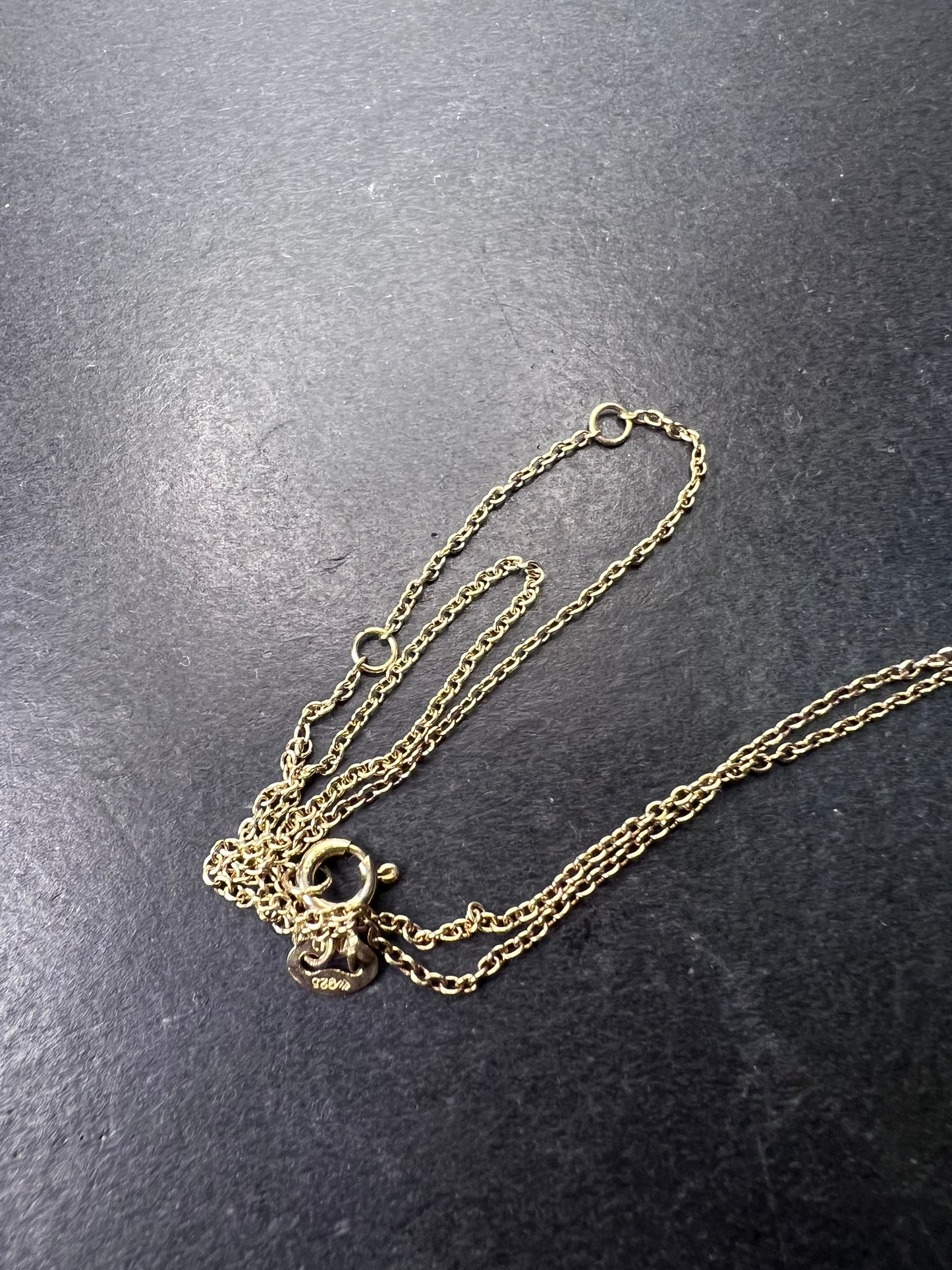 Gold over sterling silver key pendant necklace with Cz stones