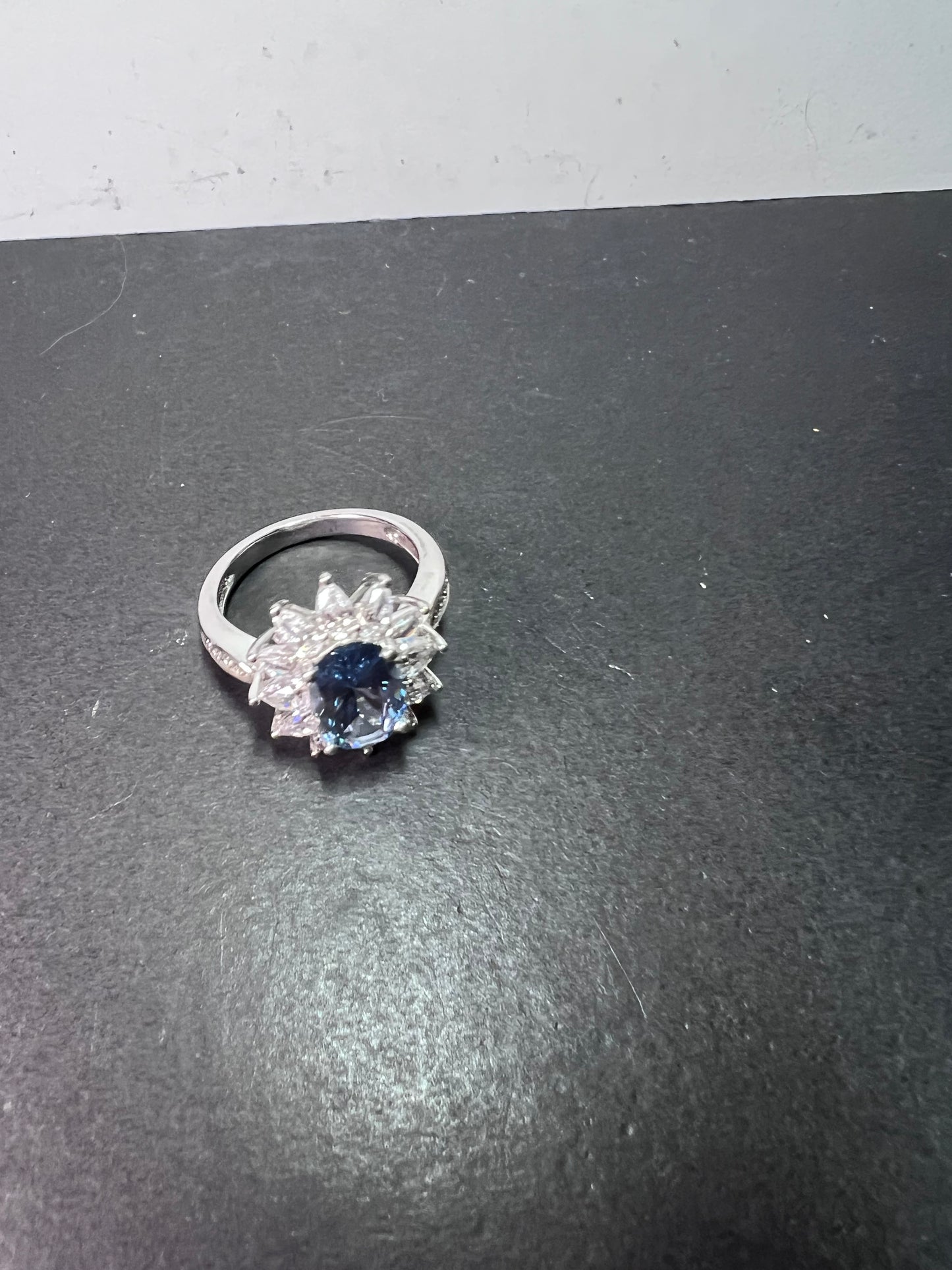 Blue lab spinel and white CZ rhodium over sterling ring size 10