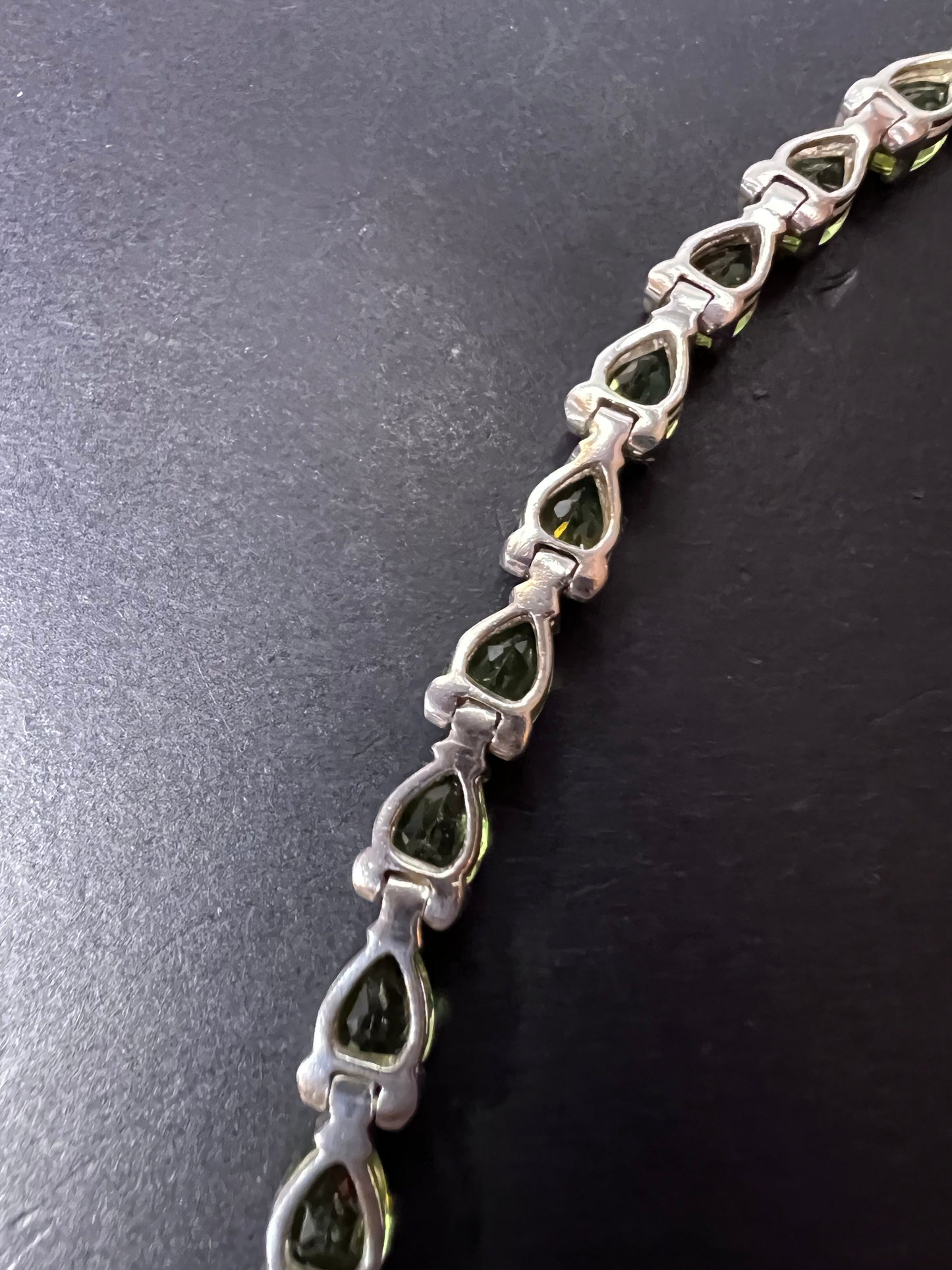 Peridot and sterling silver tennis bracelet