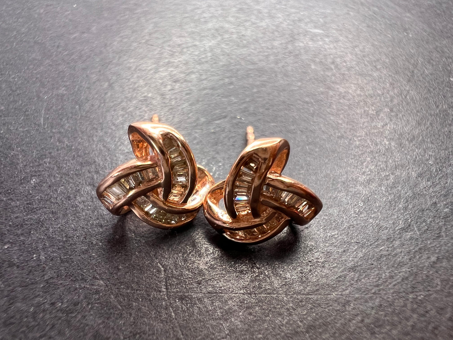 Champagne diamond knotted stud earrings in 14k rose gold over sterling silver .25ctw