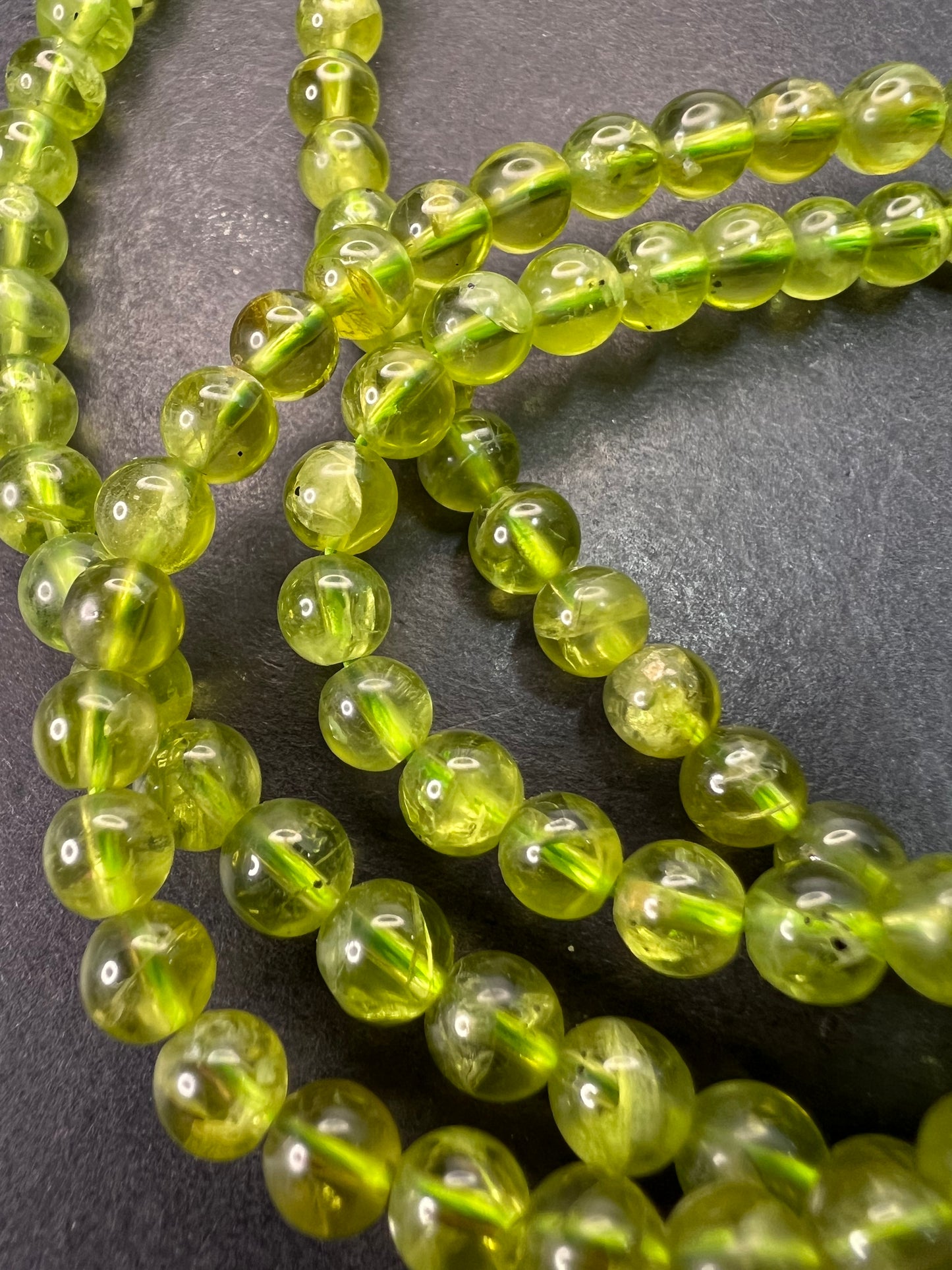 6mm high grade peridot beaded 36 inch necklace with sterling silver clasp