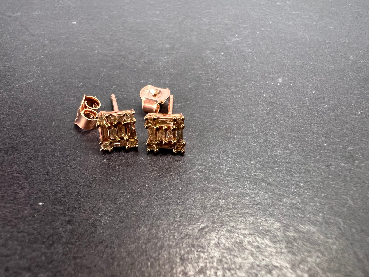 Diamond stud earrings in rose gold over sterling silver