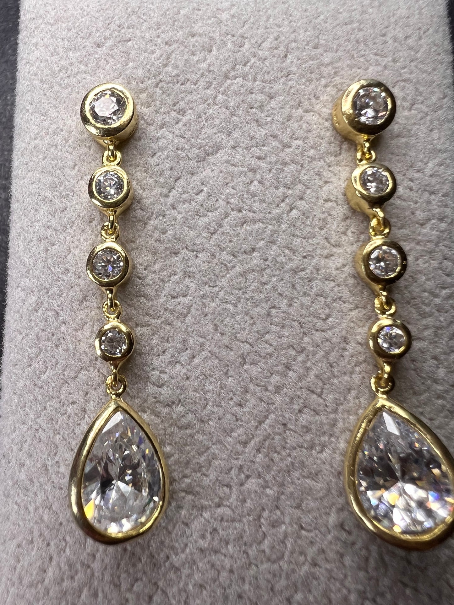 Long teardrop CZ earrings in gold over sterling silver