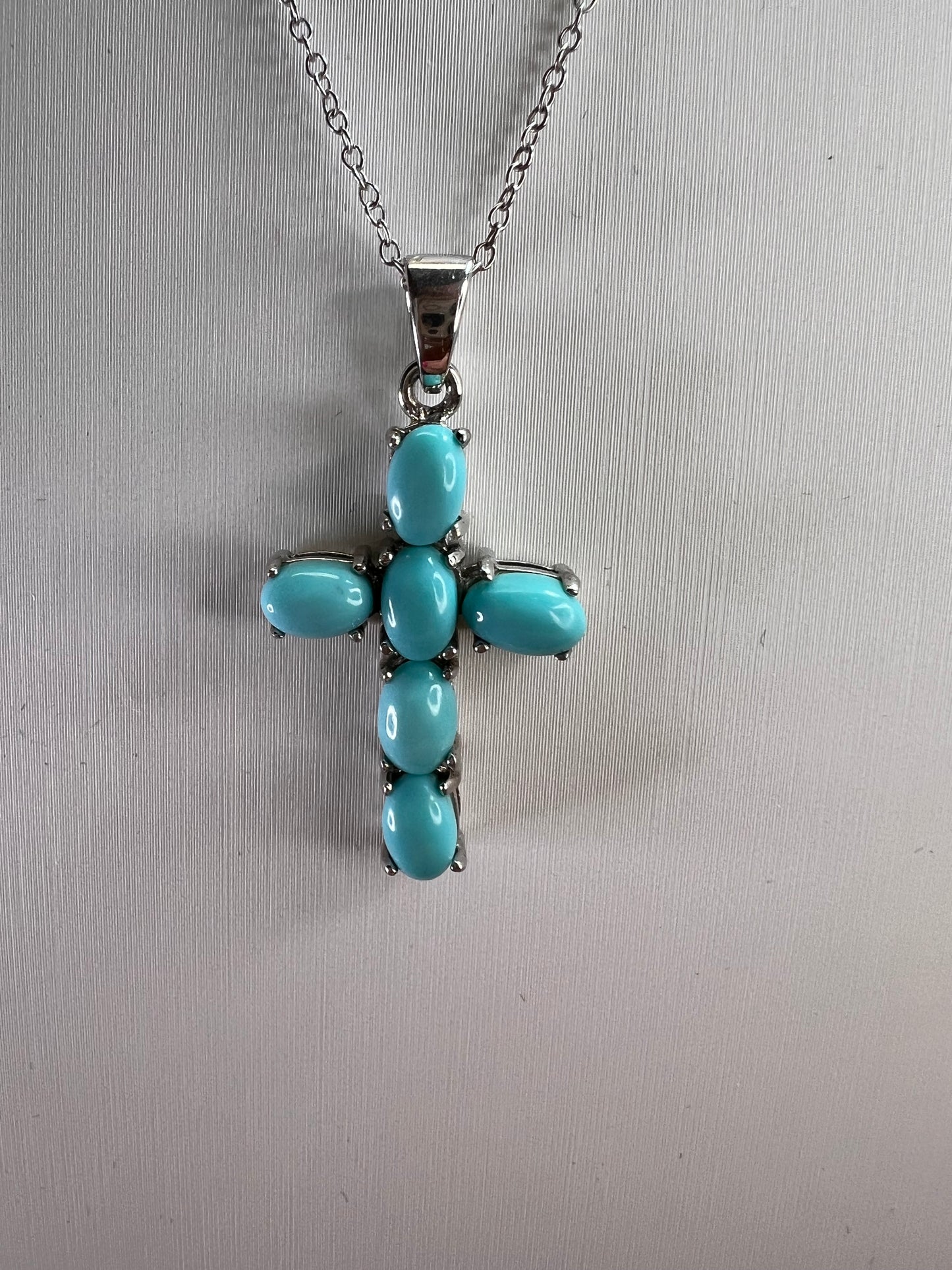 Sleeping Beauty turquoise cross pendant and chain  in rhodium over sterling silver necklace