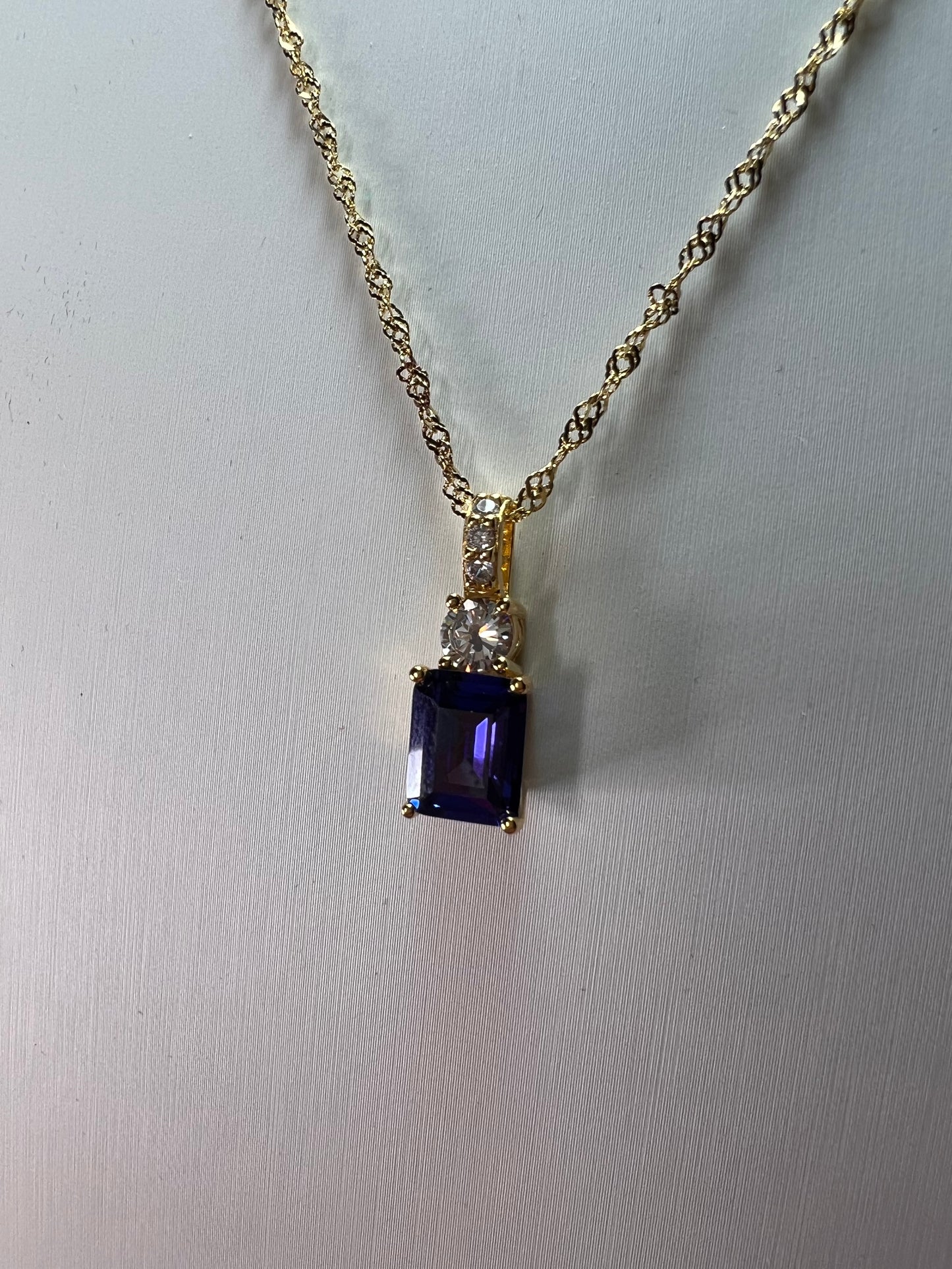 Blue emerald cut CZ pendant and chain necklace in gold over sterling silver 18 inches