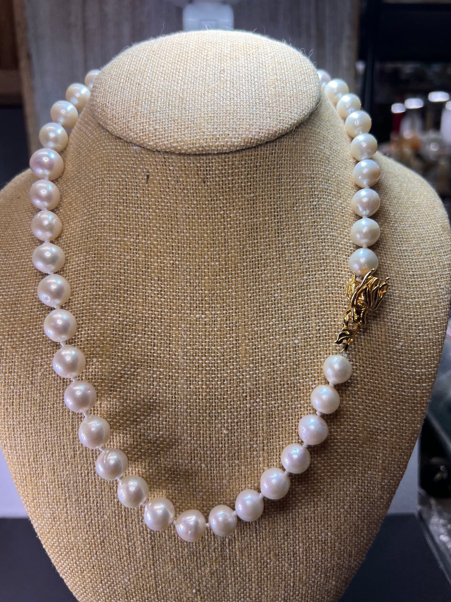 10-11mm white cultured pearl necklace with gold over sterling silver wolf head clasp 20 inch