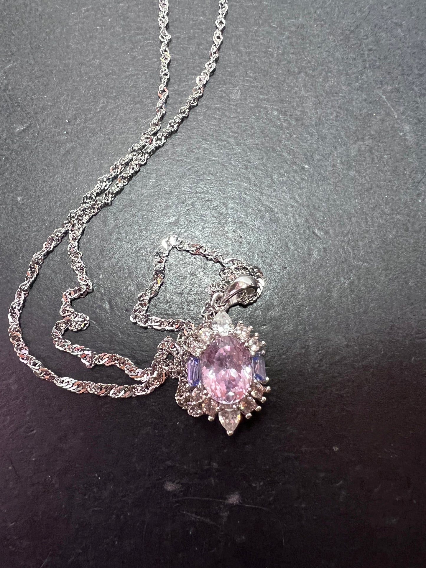 2.11ct Kunzite, 0.18ctw Tanzanite And 0.87ctw White Zircon Rhodium Over Silver halo Pendant With Chain