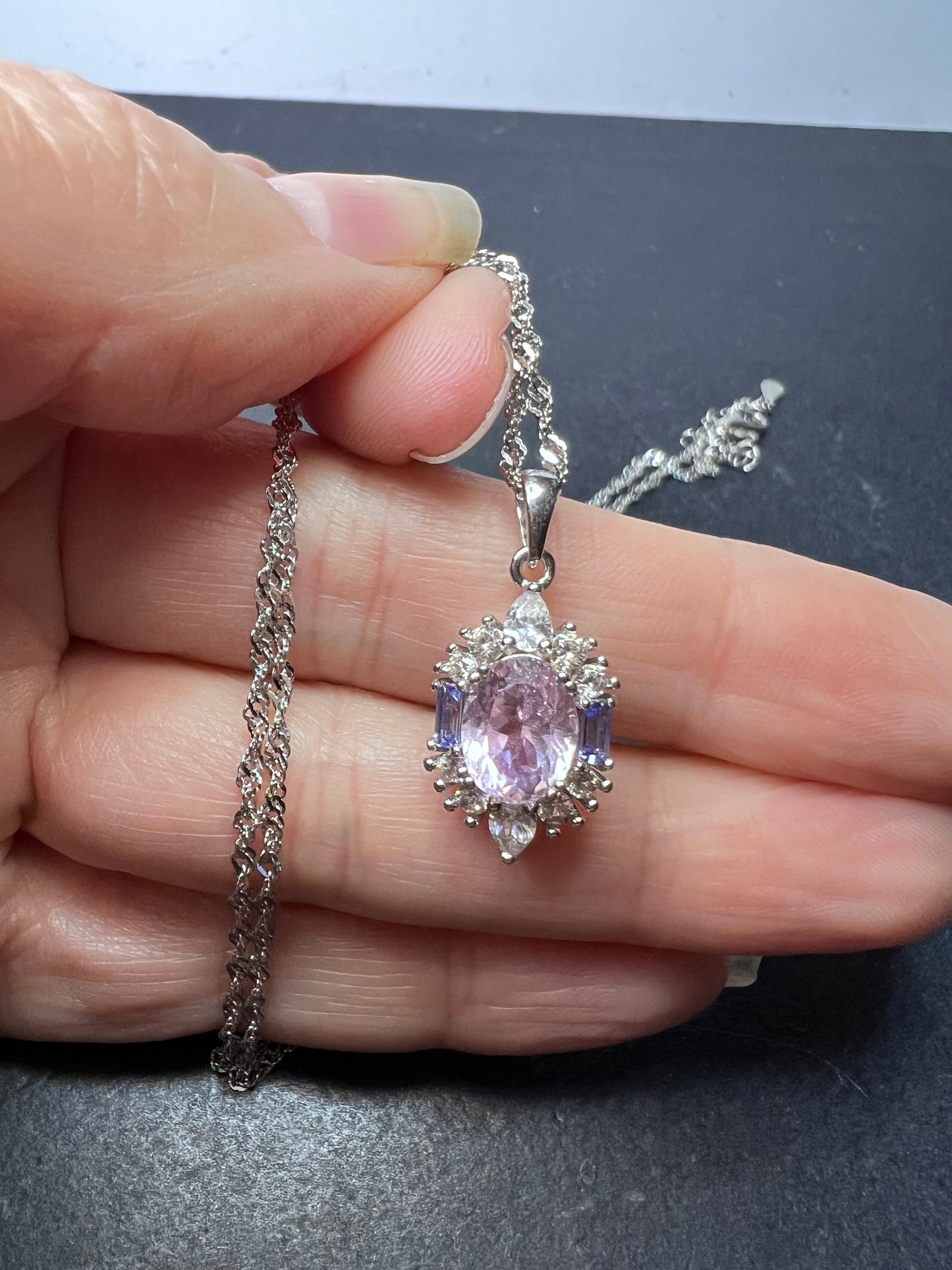 2.11ct Kunzite, 0.18ctw Tanzanite And 0.87ctw White Zircon Rhodium Over Silver halo Pendant With Chain