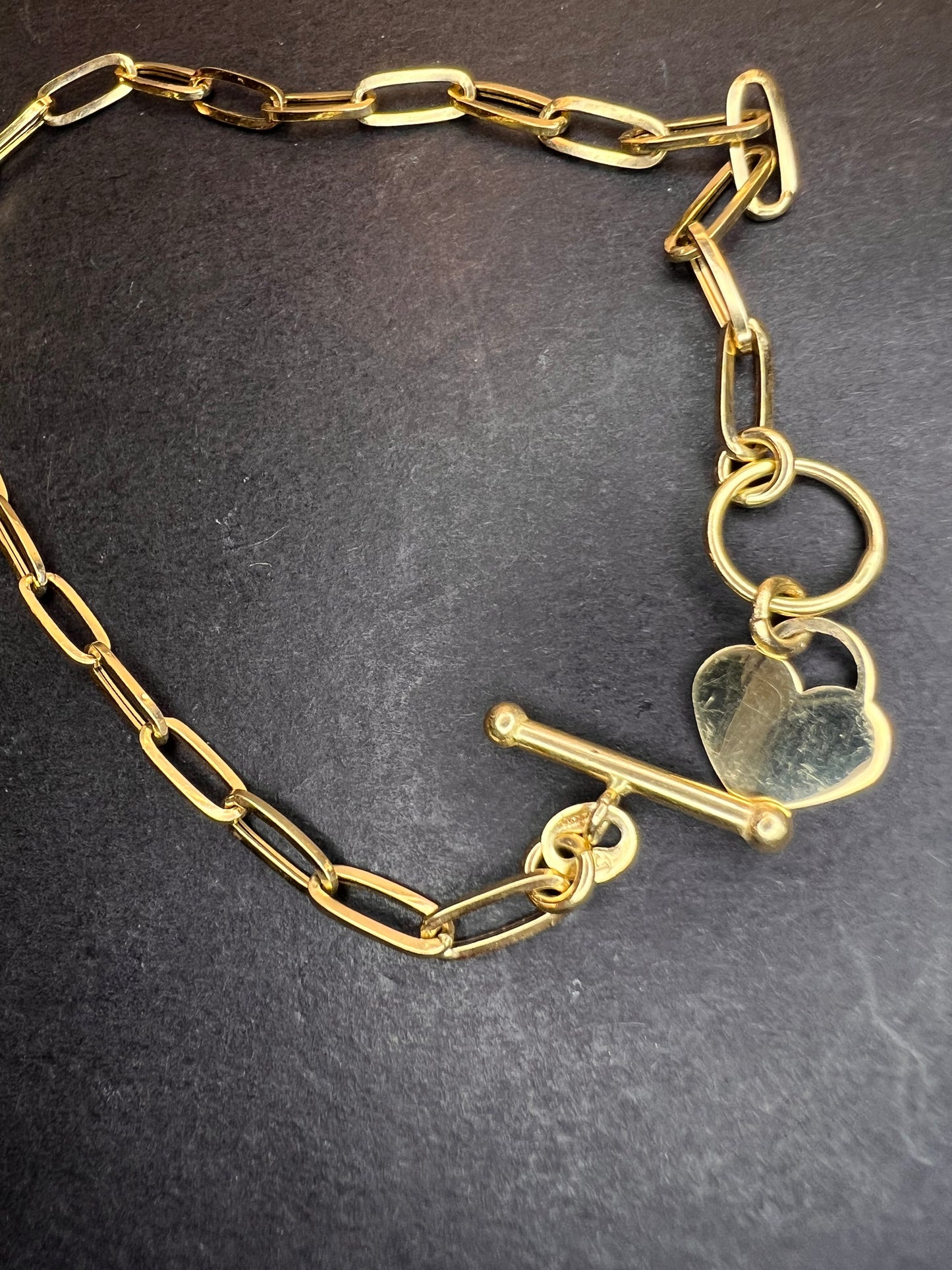 Italian 10k yellow gold paper clip heart bracelet with heart toggle