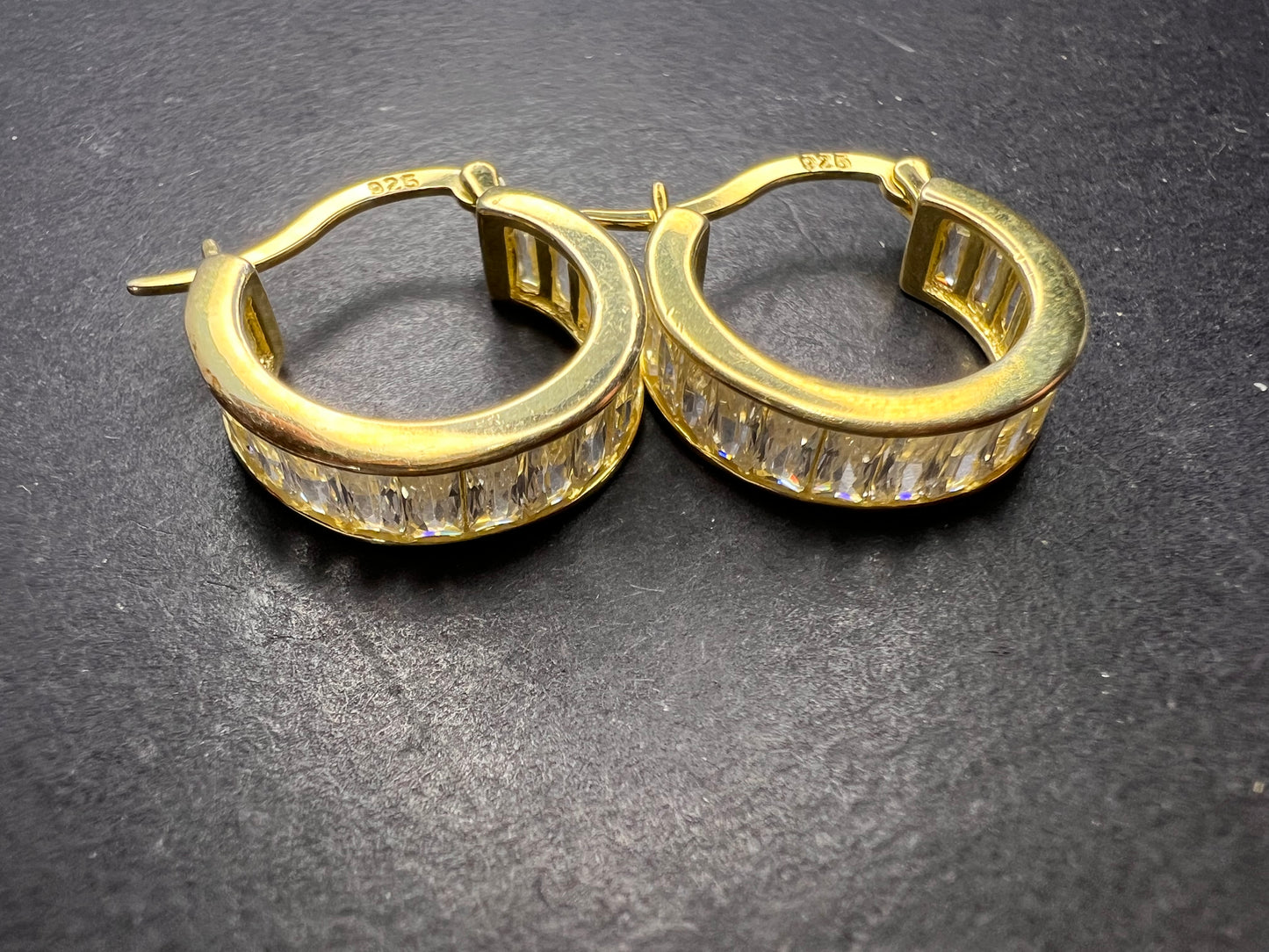 CZ huggie hoop earrings in yellow gold over sterling silver