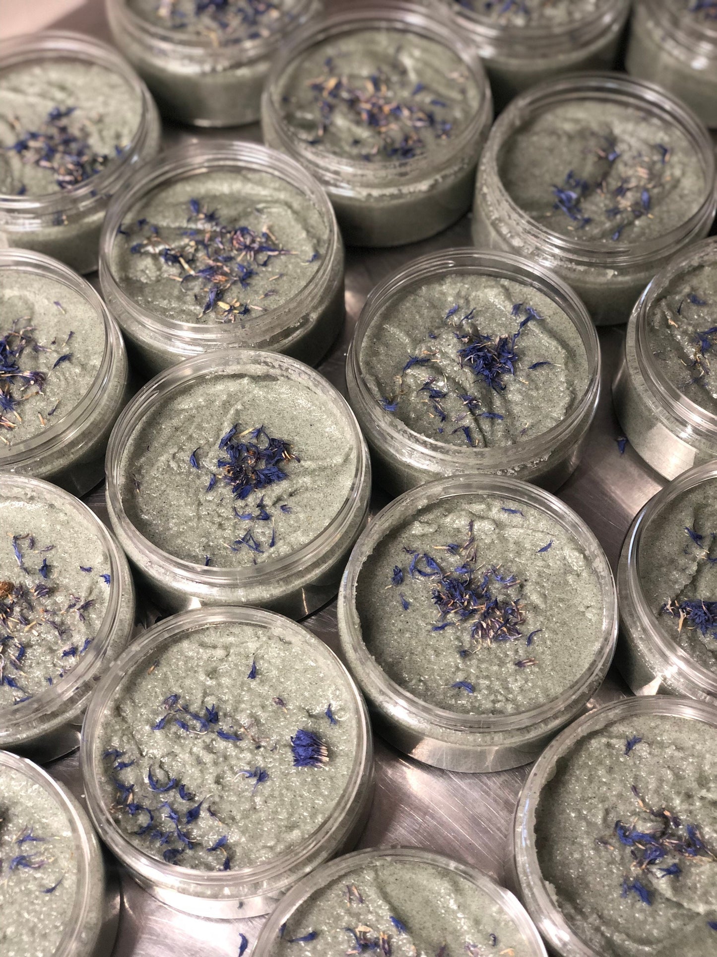 Tranquilikitty Body Scrub. Fir Needle . Lavender. Essential Oils. Organic Coconut Oil. Organic Shea Butter. Made in Utah.