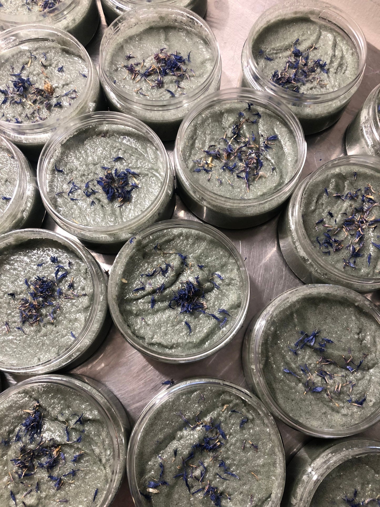 Tranquilikitty Body Scrub. Fir Needle . Lavender. Essential Oils. Organic Coconut Oil. Organic Shea Butter. Made in Utah.