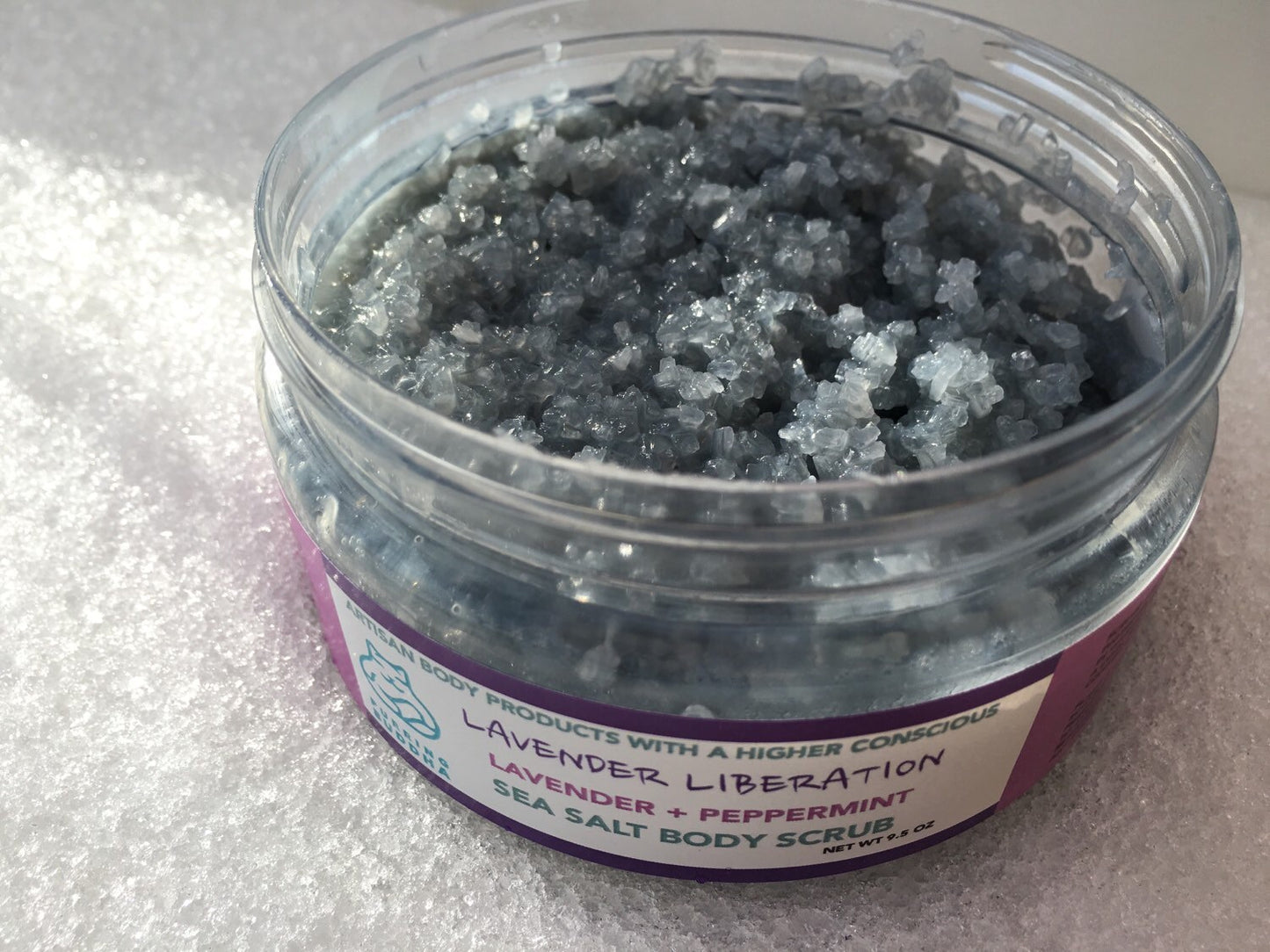 Lavender Liberation Sea Salt Scrub.Peppermint. Lavender. Essential Oils. Organic Coconut Oil. Organic Shea Butter. Made in Utah.